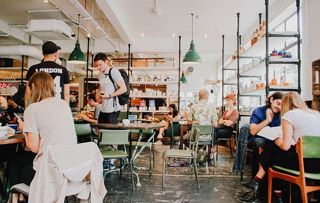 header image People eating in cafe